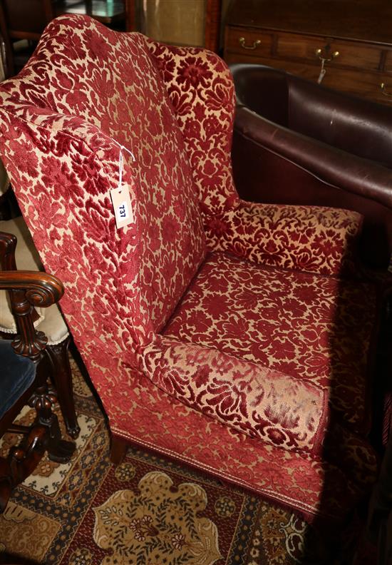 Upholstered wing armchair